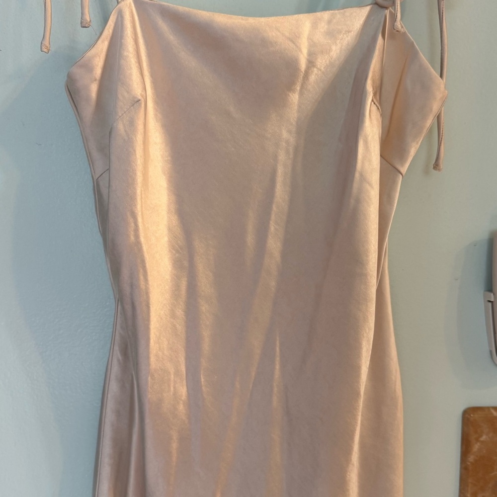 Princess Polly mini slip dress with tie straps. Gold/champagne color.